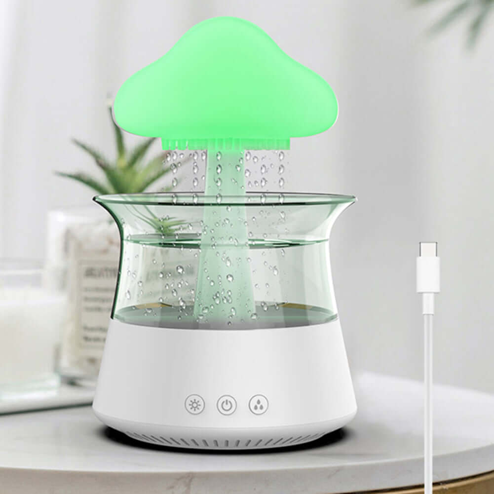 Mushroom Rain Air Humidifier showing a green light with water rain drops coming out of it